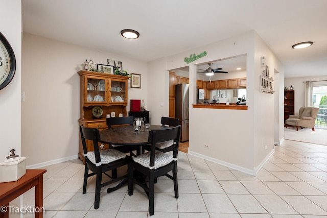 1312 Shawford Way Unit 1312, Elgin, IL 60120 - dining space featuring ceiling fan, light tile patterned floors, and baseboards