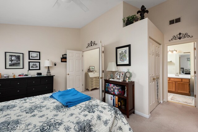 1312 Shawford Way Unit 1312, Elgin, IL 60120 - bedroom with light colored carpet, ensuite bathroom, baseboards, and a ceiling fan