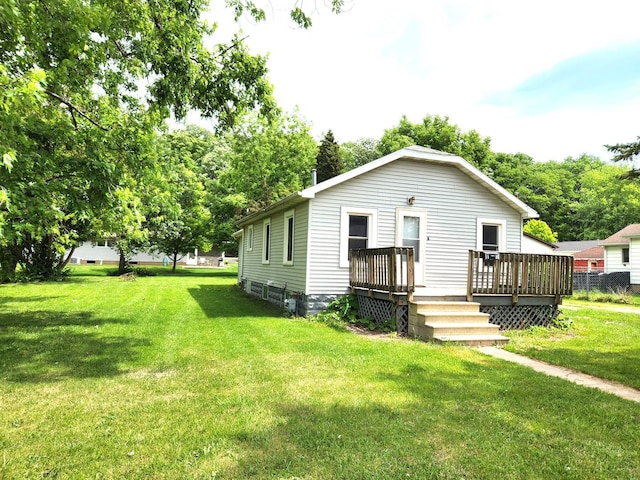 1198 E Bluff St, Marseilles, IL 61341 - view of front of home with a wooden deck and a front yard