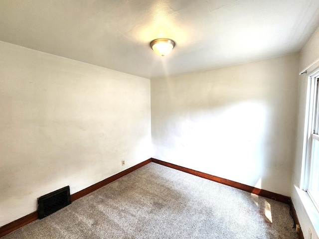 1198 E Bluff St, Marseilles, IL 61341 - empty room with carpet floors and baseboards