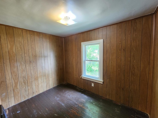 1198 E Bluff St, Marseilles, IL 61341 - unfurnished room with hardwood / wood-style floors and wood walls