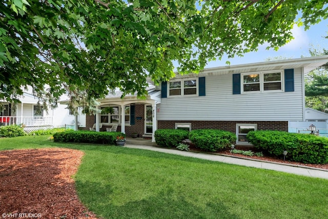 408 S Cedar Rd, New Lenox, IL 60451 - split level home with a front lawn and covered porch