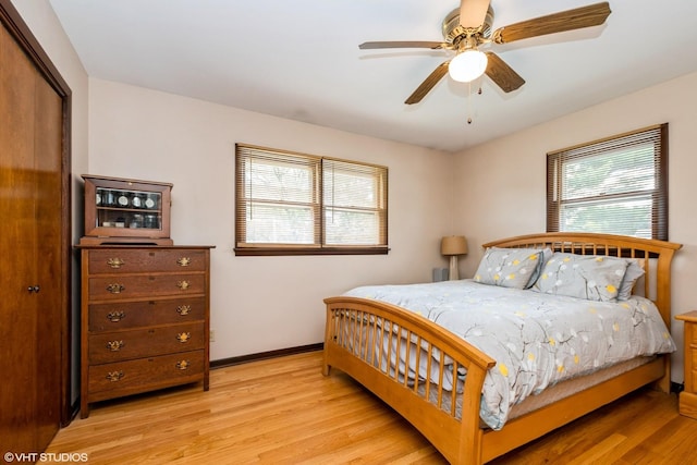 408 S Cedar Rd, New Lenox, IL 60451 - bedroom featuring light wood finished floors, a closet, and ceiling fan