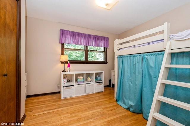 408 S Cedar Rd, New Lenox, IL 60451 - unfurnished bedroom featuring wood finished floors and baseboards