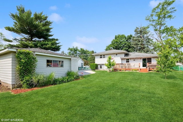 408 S Cedar Rd, New Lenox, IL 60451 - view of green lawn featuring a deck