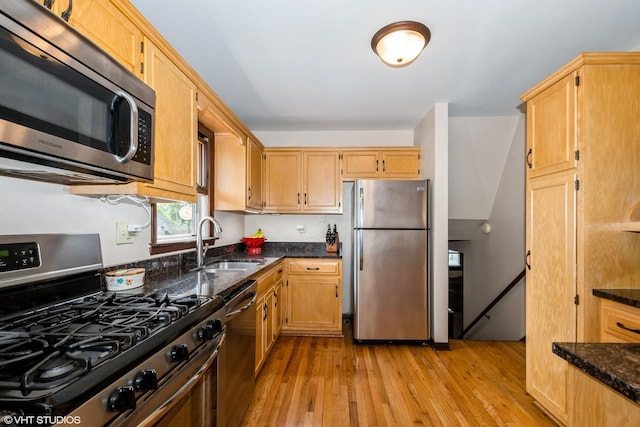 408 S Cedar Rd, New Lenox, IL 60451 - kitchen featuring appliances with stainless steel finishes, light wood-style floors, and dark stone countertops