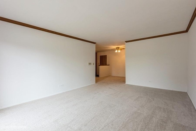 6700 S Brainard Ave Unit 104, Countryside, IL 60525 - unfurnished room featuring ornamental molding and light carpet