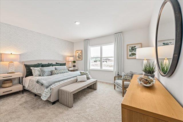 416 Rockwell Rd, Aurora, IL 60506 - bedroom with light carpet and baseboards