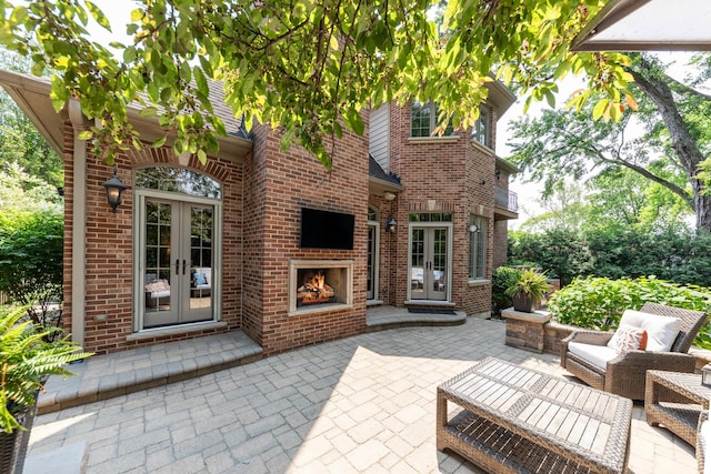655 Thornwood Dr, Naperville, IL 60540 - view of patio featuring french doors and an outdoor brick fireplace