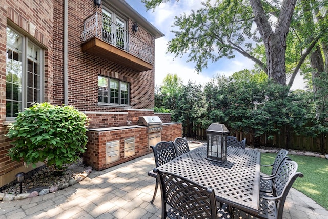655 Thornwood Dr, Naperville, IL 60540 - view of patio / terrace featuring outdoor dining space and a balcony