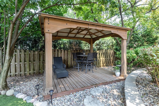 655 Thornwood Dr, Naperville, IL 60540 - wooden deck with a gazebo, a fenced backyard, and outdoor dining area