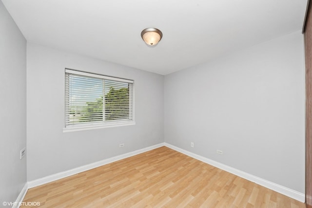 5600 Astor Ln Unit 301, Rolling Meadows, IL 60008 - unfurnished room with wood finished floors and baseboards
