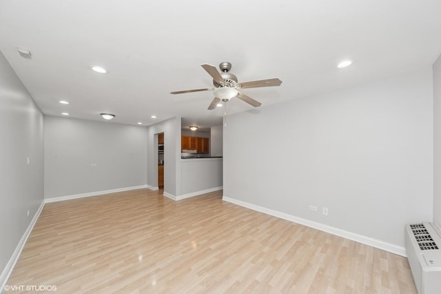 5600 Astor Ln Unit 301, Rolling Meadows, IL 60008 - unfurnished living room with baseboards, light wood-type flooring, a ceiling fan, and recessed lighting