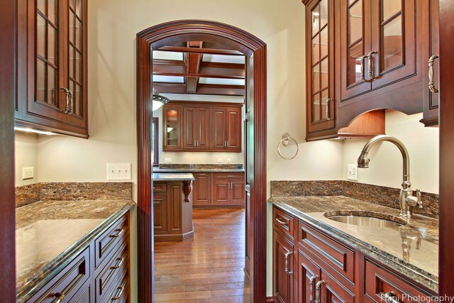 273 Donlea Rd, Barrington Hills, IL 60010 - kitchen featuring a sink, hardwood / wood-style floors, coffered ceiling, beamed ceiling, and glass insert cabinets