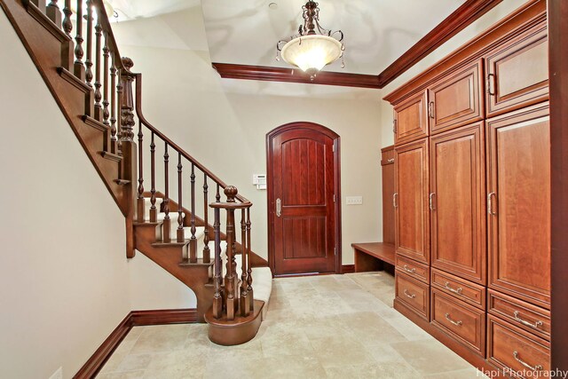 273 Donlea Rd, Barrington Hills, IL 60010 - entryway featuring baseboards, stairs, and crown molding
