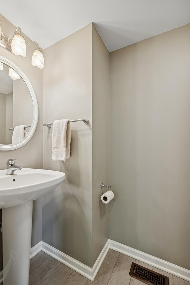 830 E Hillside Ave Unit 830, Barrington, IL 60010 - bathroom with a sink and baseboards