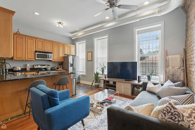 2212 N Campbell Ave Unit 1D, Chicago, IL 60647 - living area featuring a ceiling fan, recessed lighting, and brick wall