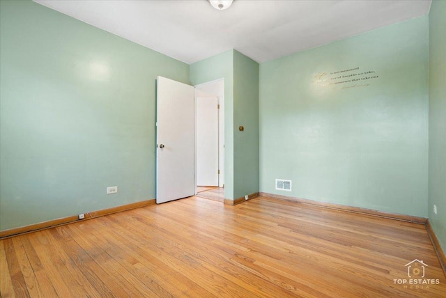 1176 S Maple Ave, Oak Park, IL 60304 - unfurnished room with light wood-style floors and baseboards
