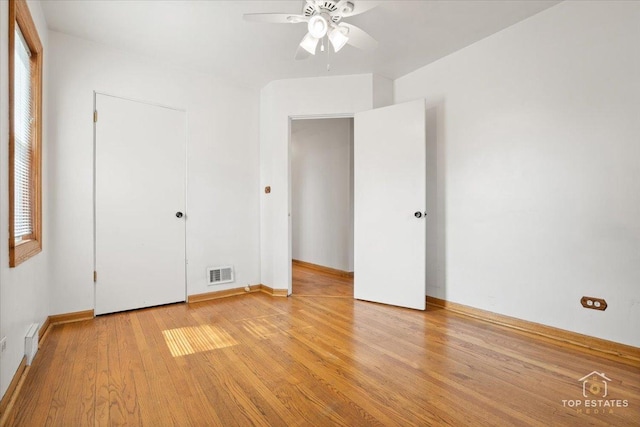1176 S Maple Ave, Oak Park, IL 60304 - unfurnished bedroom with light wood-type flooring and baseboards