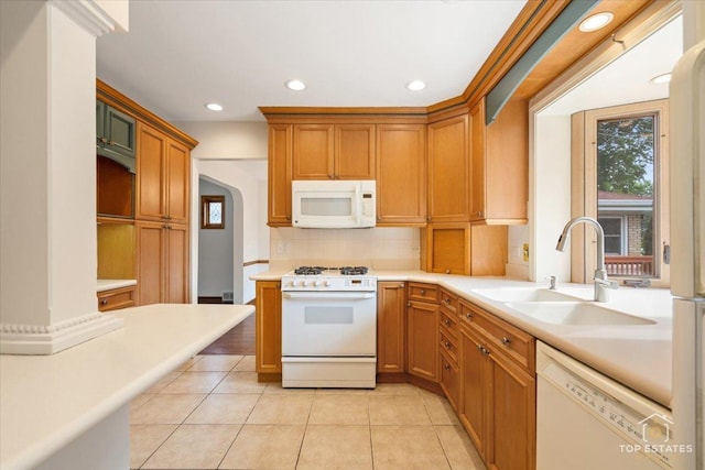 1176 S Maple Ave, Oak Park, IL 60304 - kitchen featuring white appliances, a sink, tasteful backsplash, recessed lighting, and light countertops