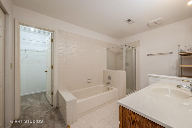 1949 N Charter Point Dr Unit 0, Arlington Heights, IL 60004 - full bathroom with a garden tub, a shower stall, a spacious closet, vanity, and tile patterned flooring