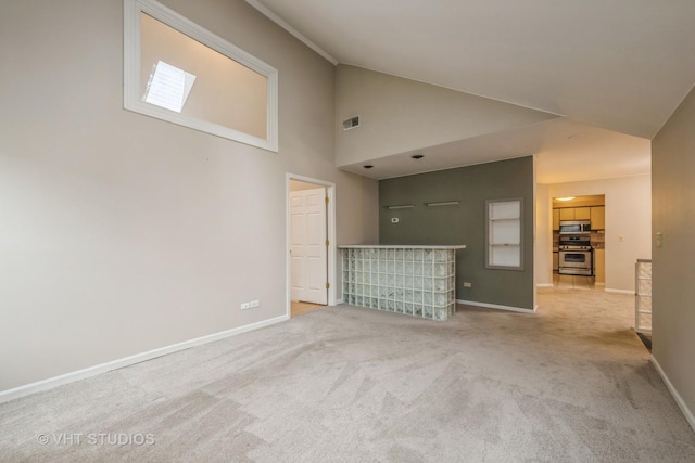 1949 N Charter Point Dr Unit 0, Arlington Heights, IL 60004 - unfurnished living room featuring carpet floors, baseboards, and high vaulted ceiling