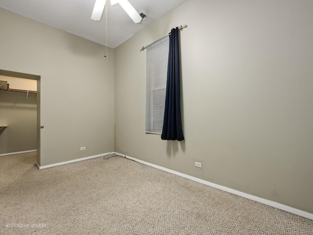 2023 W Armitage Ave, Chicago, IL 60647 - unfurnished bedroom with carpet, a walk in closet, ceiling fan, and a closet