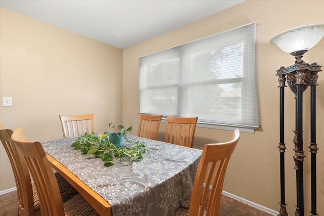 391 Northgate Rd, Lindenhurst, IL 60046 - dining room featuring baseboards, plenty of natural light, and carpet