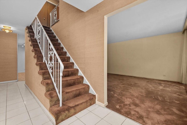 3227 River Falls Dr, Northbrook, IL 60062 - staircase featuring tile patterned flooring, baseboards, and carpet floors