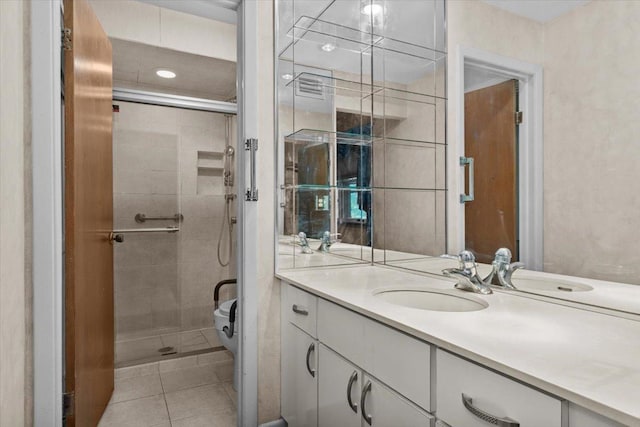 3227 River Falls Dr, Northbrook, IL 60062 - bathroom featuring vanity, a shower stall, and tile patterned floors
