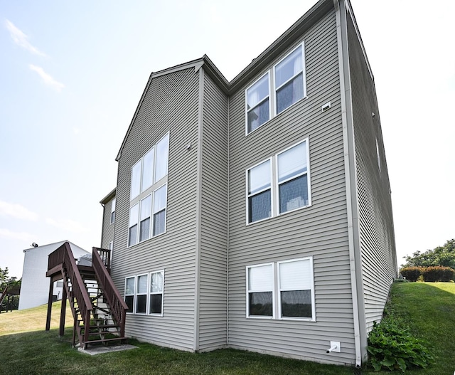 2621 Connolly Ln, West Dundee, IL 60118 - back of house with stairway, a lawn, and a deck