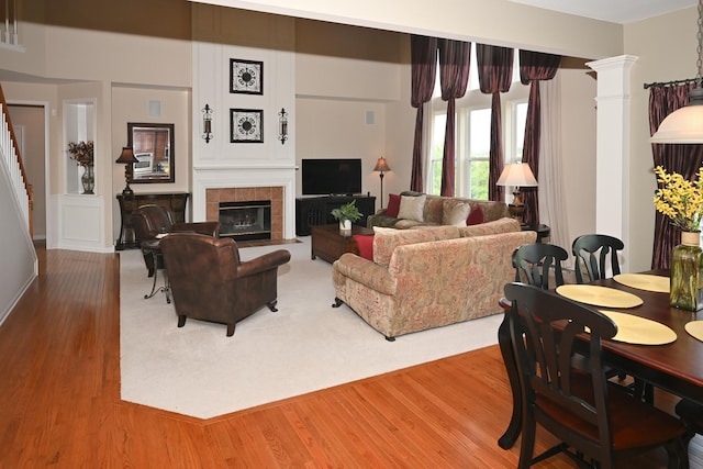 2621 Connolly Ln, West Dundee, IL 60118 - living area with wood finished floors, stairs, and a tile fireplace