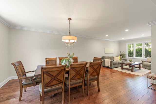 389 Pearson Cir, Naperville, IL 60563 - dining area featuring ornamental molding, dark wood-type flooring, recessed lighting, and a chandelier