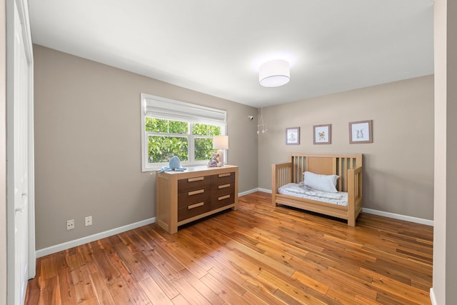 389 Pearson Cir, Naperville, IL 60563 - bedroom featuring light wood-style floors and baseboards
