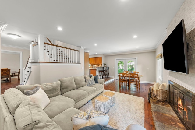 389 Pearson Cir, Naperville, IL 60563 - living area featuring stairs, dark wood-style flooring, crown molding, recessed lighting, and a fireplace