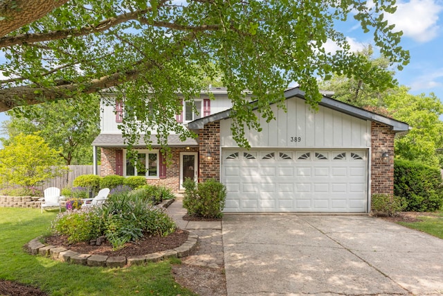 389 Pearson Cir, Naperville, IL 60563 - view of front of house with brick siding, concrete driveway, a garage, a shingled roof, and board and batten siding