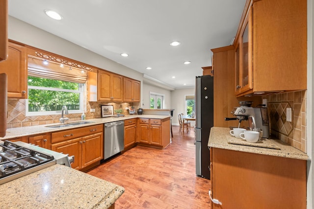 389 Pearson Cir, Naperville, IL 60563 - kitchen with appliances with stainless steel finishes, healthy amount of natural light, light wood finished floors, recessed lighting, and a peninsula