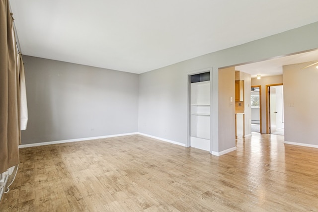 241 Northway Park Rd Unit 10, Machesney Park, IL 61115 - empty room with light wood finished floors and baseboards