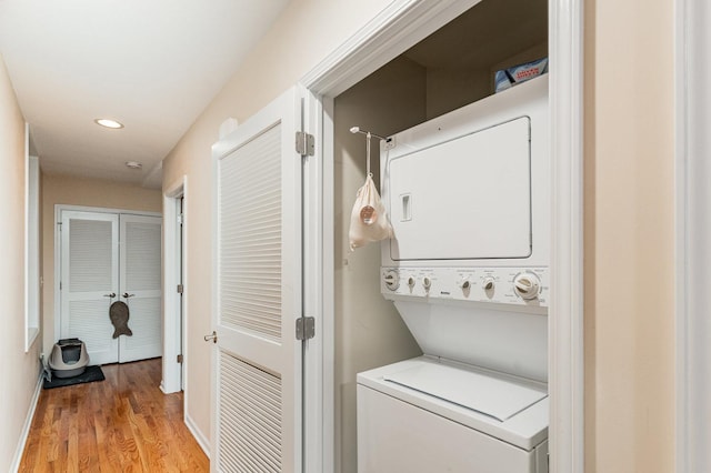 3134 S Morgan St, Chicago, IL 60608 - laundry room with stacked washer / drying machine, light wood-style flooring, recessed lighting, and baseboards