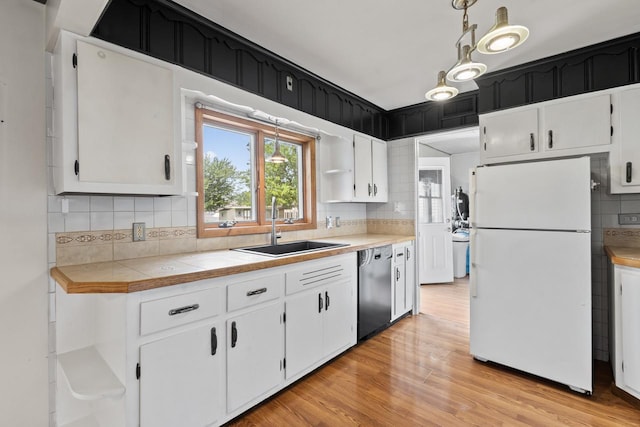35632 N Sheridan Dr, Fox Lake, IL 60020 - kitchen with freestanding refrigerator, dishwasher, open shelves, and white cabinets
