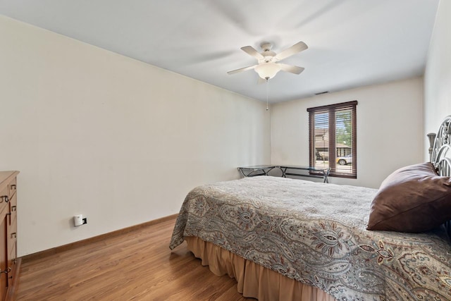 35632 N Sheridan Dr, Fox Lake, IL 60020 - bedroom with light wood-style floors and ceiling fan
