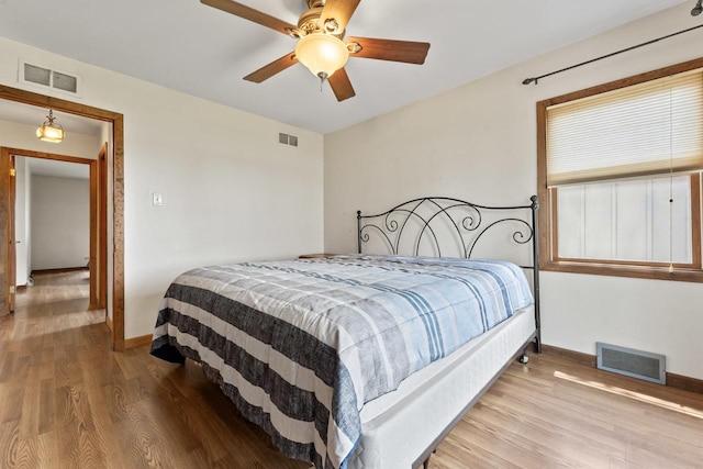 35632 N Sheridan Dr, Fox Lake, IL 60020 - bedroom featuring wood finished floors and ceiling fan