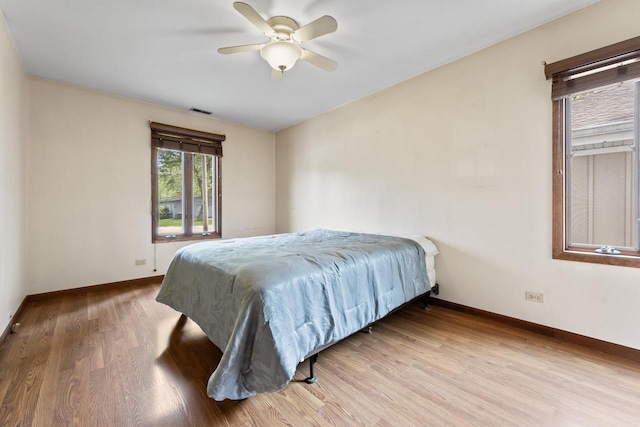 35632 N Sheridan Dr, Fox Lake, IL 60020 - bedroom featuring wood finished floors and ceiling fan