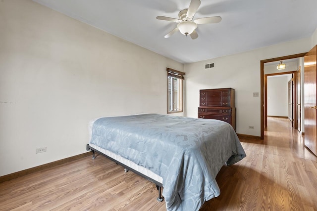 35632 N Sheridan Dr, Fox Lake, IL 60020 - bedroom featuring light wood-type flooring and a ceiling fan