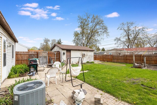 431 Montrose Dr, Romeoville, IL 60446 - view of patio with cooling unit and an outbuilding