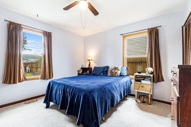 431 Montrose Dr, Romeoville, IL 60446 - bedroom featuring carpet, baseboards, and ceiling fan