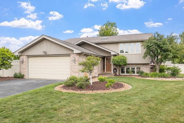 13641 W Ironwood Cir, Homer Glen, IL 60491 - view of front of property featuring brick siding, driveway, an attached garage, and a shingled roof