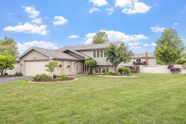 13641 W Ironwood Cir, Homer Glen, IL 60491 - view of front of home featuring brick siding, asphalt driveway, a garage, and roof with shingles