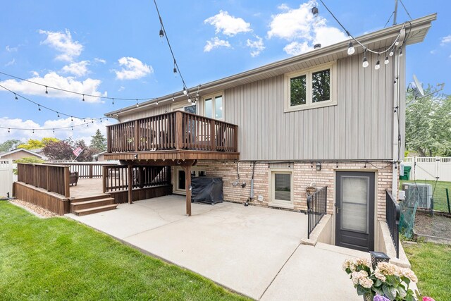 13641 W Ironwood Cir, Homer Glen, IL 60491 - back of property featuring a wooden deck, a patio area, and brick siding