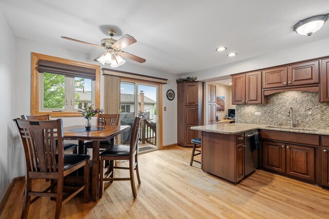 13641 W Ironwood Cir, Homer Glen, IL 60491 - kitchen featuring a sink, light wood-type flooring, healthy amount of natural light, a ceiling fan, and recessed lighting